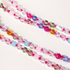 Charmkette Glasperlen mit rosa Band, vergoldet