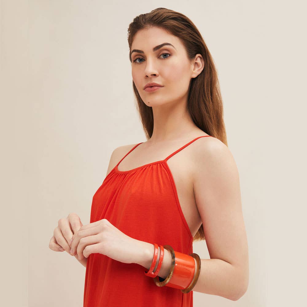 Schmuckmanschette, Armreif und Armband aus orangefarbenem Horn, weihnachtliches Accessoire. : Große