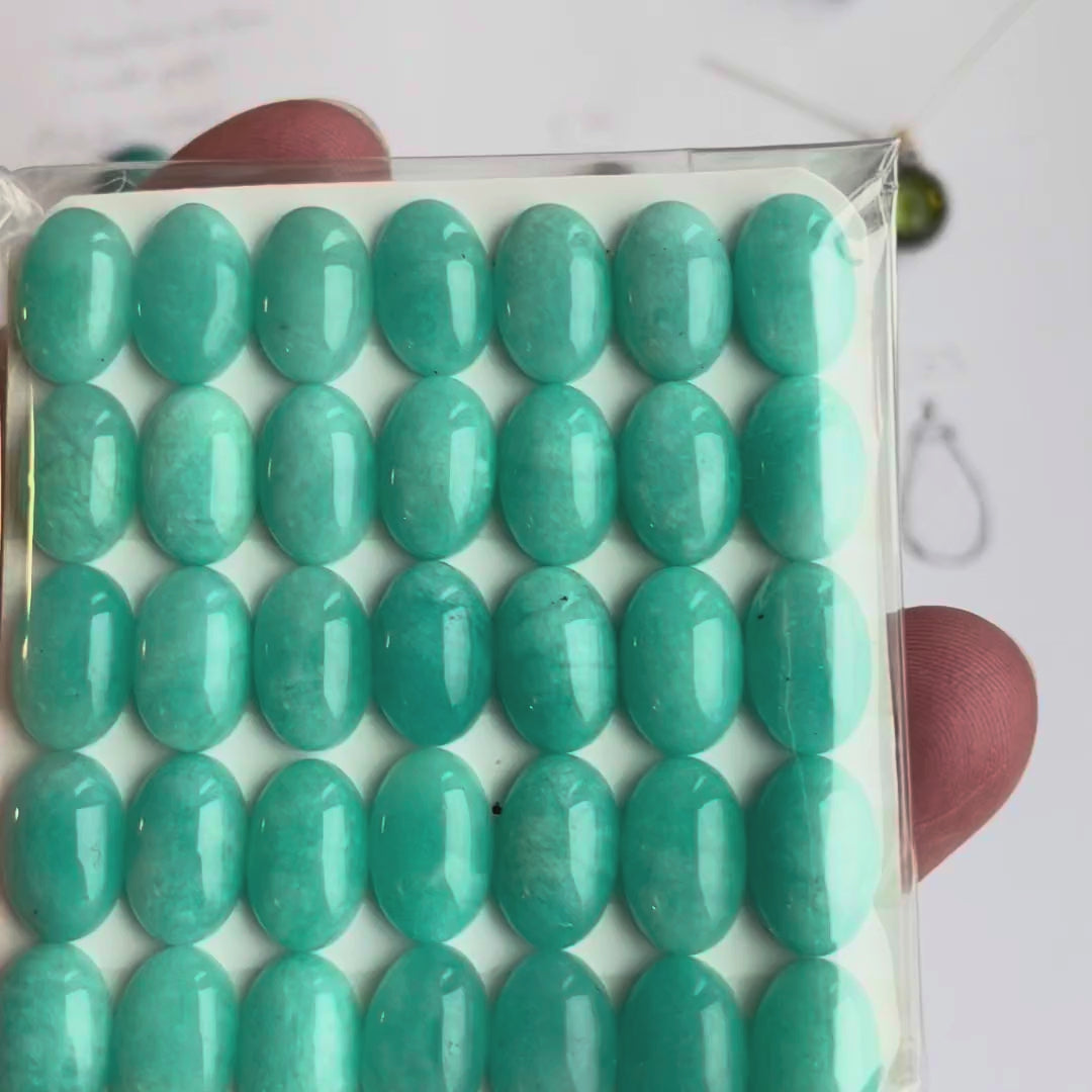Video: Amazonit Cabochons oval 8 x 12 mm